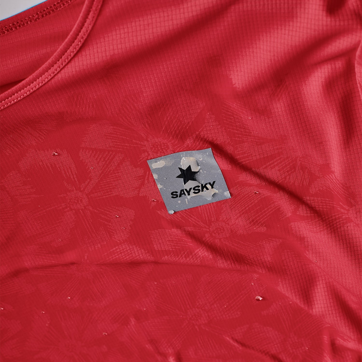ランニングTシャツ NWRSS60c1037 W Reactive Flow T-shirt - Red Aop [レディーズ]