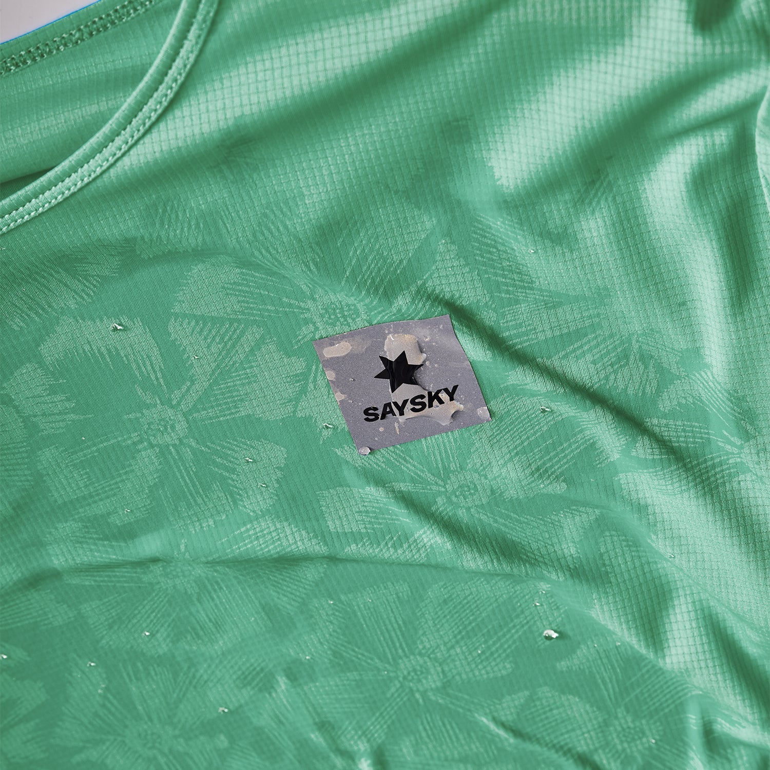 ランニングTシャツ NWRSS60c1038 W Reactive Flow T-shirt - Green Aop [レディーズ]